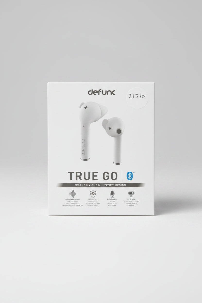 Box of Defunc True Go wireless earbuds on a beige background